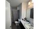 Functional bathroom featuring a single vanity and a shower-tub combo with modern fixtures at 342 Red Fox Rd., Myrtle Beach, SC 29579