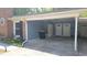 Carport with attached storage, providing convenient covered parking and extra storage space at 342 Red Fox Rd., Myrtle Beach, SC 29579
