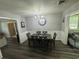 Stylish dining room with a chandelier and a dining table, perfect for Gathering meals and entertaining guests at 342 Red Fox Rd., Myrtle Beach, SC 29579