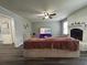 Bright living room featuring a fireplace, ceiling fan, and gray walls, creating a cozy and modern atmosphere at 342 Red Fox Rd., Myrtle Beach, SC 29579