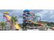 A water park with multiple tall water slides with green, orange, purple, and white slides at 342 Red Fox Rd., Myrtle Beach, SC 29579