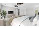Beautifully staged bedroom with a ceiling fan, large bed, stylish furniture, and a neutral color palette at 356 Whipple Run Loop, Myrtle Beach, SC 29588