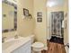 Bathroom features vanity sink with tile accent mirror and shower with patterned curtain at 4006 Fairway Lakes Dr. # 4006, Myrtle Beach, SC 29577
