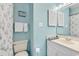 Bathroom features a white vanity, toilet and a shower curtain with a floral pattern at 4006 Fairway Lakes Dr. # 4006, Myrtle Beach, SC 29577