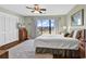 Bright bedroom boasts a ceiling fan, closet, and large sliding glass doors to deck at 4006 Fairway Lakes Dr. # 4006, Myrtle Beach, SC 29577