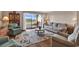 Cozy living room with hardwood floors, comfortable seating, and a view of the community at 4006 Fairway Lakes Dr. # 4006, Myrtle Beach, SC 29577