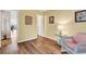Inviting living area features hardwood floors, natural light, and comfortable wicker seating at 4006 Fairway Lakes Dr. # 4006, Myrtle Beach, SC 29577
