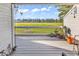 A covered patio with a view of the green space and pond at 4006 Fairway Lakes Dr. # 4006, Myrtle Beach, SC 29577