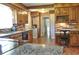 Kitchen with ample cabinetry, granite countertops, and designated coffee bar area at 4196 E Highway 319, Conway, SC 29526
