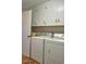 Functional laundry room featuring a washer, dryer, and ample storage space at 4196 E Highway 319, Conway, SC 29526