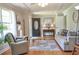 Inviting living room featuring hardwood floors, neutral decor, and an abundance of natural light at 4196 E Highway 319, Conway, SC 29526