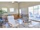 Bright sunroom featuring modern furniture, sliding glass doors, and tile flooring at 4196 E Highway 319, Conway, SC 29526