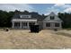 Attractive one-story home featuring gray brick and a gabled roof, creating a charming and inviting curb appeal at 4268 Long Avenue Ext., Conway, SC 29526