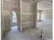 Unfinished living room featuring neutral walls with a window to let natural light in at 4268 Long Avenue Ext., Conway, SC 29526