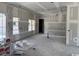 Unfinished living room, featuring large windows and drywall, ready for personalized finishes and design at 4268 Long Avenue Ext., Conway, SC 29526