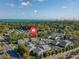 Aerial view of the community showcasing lush greenery, a pool, and proximity to the ocean at 4712 Cobblestone Dr. # K-7, Myrtle Beach, SC 29577