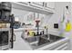 Modern kitchen sink and stainless steel appliances at 4712 Cobblestone Dr. # K-7, Myrtle Beach, SC 29577