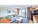 Comfortable living room with kitchenette and ocean view, leads out to the private balcony at 4800 S Ocean Blvd. # 708, North Myrtle Beach, SC 29582