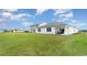 Spacious backyard and covered patio, perfect for outdoor relaxation and entertaining at 481 Blissful Ln., Little River, SC 29566