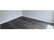 Bedroom with hardwood flooring, fresh paint, and modern electrical outlets and light switches at 484 Honeyhill Loop, Conway, SC 29526