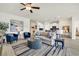 Spacious open-concept living room with hardwood floors and modern furnishings at 500 Honeyhill Loop, Conway, SC 29526