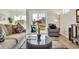 Comfortable living room with view of the pond, slider door, and natural light at 500 Honeyhill Loop, Conway, SC 29526