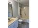 Bathroom featuring a shower/tub combo with safety bars and vanity at 5001 Little River Rd. # 501E, Myrtle Beach, SC 29577
