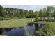 View of the lush golf course and pond at 5001 Little River Rd. # 501E, Myrtle Beach, SC 29577