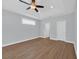 Neutral bedroom offering a tray ceiling, ceiling fan, and two closets at 5132 Little River Neck Rd., North Myrtle Beach, SC 29582