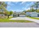 The home boasts a two-car garage and well-maintained landscaping at 5132 Little River Neck Rd., North Myrtle Beach, SC 29582