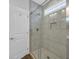 Modern bathroom features a glass enclosed tile shower and a built-in niche at 5132 Little River Neck Rd., North Myrtle Beach, SC 29582