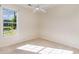 This bedroom has a large window with natural lighting and carpeted floors at 2934 Midiron Ct., Myrtle Beach, SC 29577