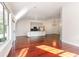 Bright open-concept living area with hardwood floors and an open kitchen with an island at 2934 Midiron Ct., Myrtle Beach, SC 29577