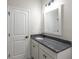 Bathroom featuring a vanity with granite countertops and a stylish faucet at 549 Honeyhill Loop, Conway, SC 29526