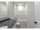 Bathroom with sleek vanity, tub/shower combo, and modern fixtures at 549 Honeyhill Loop, Conway, SC 29526