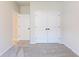 Bedroom with carpeting features double closet doors and a standard doorway at 549 Honeyhill Loop, Conway, SC 29526