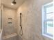 New bathroom shower with a large shower head and tiled surround at 549 Honeyhill Loop, Conway, SC 29526