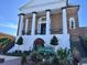 Exterior view of historic City Hall building with classic architectural design and seasonal decorations at 553 Honeyhill Loop, Conway, SC 29526