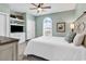 Well-lit bedroom with a ceiling fan and a view of the yard at 5750 Oyster Catcher Dr. # 1135, North Myrtle Beach, SC 29582