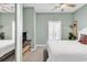 Bright, airy bedroom with neutral colors and a mirrored closet at 5750 Oyster Catcher Dr. # 1135, North Myrtle Beach, SC 29582