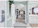 Inviting foyer showcasing an open floor plan that leads into the living room and a glimpse of the well-equipped kitchen at 5750 Oyster Catcher Dr. # 1135, North Myrtle Beach, SC 29582