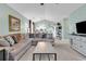 Spacious living room with an open layout and access to the dining area at 5750 Oyster Catcher Dr. # 1135, North Myrtle Beach, SC 29582