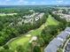 Views of the complex located on a lush green golf course with mature trees at 5825 Catalina Dr. # 1034, North Myrtle Beach, SC 29582