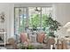 Balcony overlooking wooded area featuring sliding glass door and furniture for outdoor relaxation at 5825 Catalina Dr. # 1034, North Myrtle Beach, SC 29582
