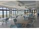 Inviting dining area with ample seating, plenty of natural light, and lovely ocean views at 5825 Catalina Dr. # 1034, North Myrtle Beach, SC 29582