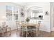 Dining room with hardwood floors and natural light is conveniently located next to the kitchen at 5825 Catalina Dr. # 1034, North Myrtle Beach, SC 29582