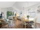 Bright and open living and dining area featuring hardwood floors, and beach themed decor at 5825 Catalina Dr. # 1034, North Myrtle Beach, SC 29582