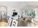 Bright living room featuring stylish decor, wood floors, comfortable seating, and a sliding glass door to the exterior at 5825 Catalina Dr. # 1034, North Myrtle Beach, SC 29582