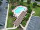 Aerial view of community pool featuring plenty of lounge chairs and shaded areas at 5825 Catalina Dr. # 1034, North Myrtle Beach, SC 29582