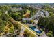 Aerial view of neighborhood with nearby pond, parking and green space at 6015 Catalina Dr. # 132, North Myrtle Beach, SC 29582